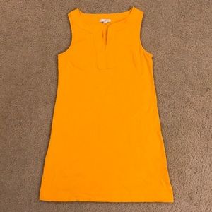 Mustard colored, sleeveless dress